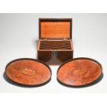 A 19th century mahogany stationary box and a pair of inlaid oval small trays (3)