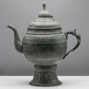 A bronze Samovar, Cover and Stand, the globular body set with an animal mask and tongue handle