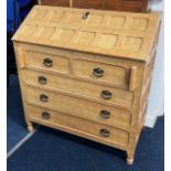 A pine effect bureau fitted with five drawers, height 93cm, width 86cm.