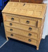 A pine effect bureau fitted with five drawers, height 93cm, width 86cm.