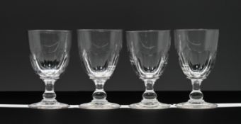 Set of four 19th century wine glasses, height 15cm.