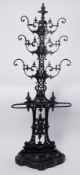 A Coalbrookdale style cast iron hallstand, height approx. 183cm.