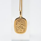 A 9ct yellow gold St. Christopher pendant with chain, 3.4g