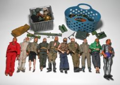 A set of fifteen action figures, circa 1970, varying in size, including Action Man, Batman, and