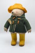 Paddington Bear with yellow boots, yellow hat and green cardigan, height 50cm.