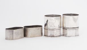 Six napkin rings to include two pairs, one child's napkin ring with animals engraved on it and one