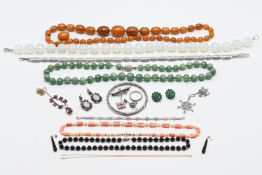 A mixed lot to include an opaline bead necklace, carved flower coral bead & pearl necklace, a