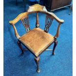 An Edwardian inlaid corner chair.