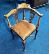 An Edwardian inlaid corner chair.