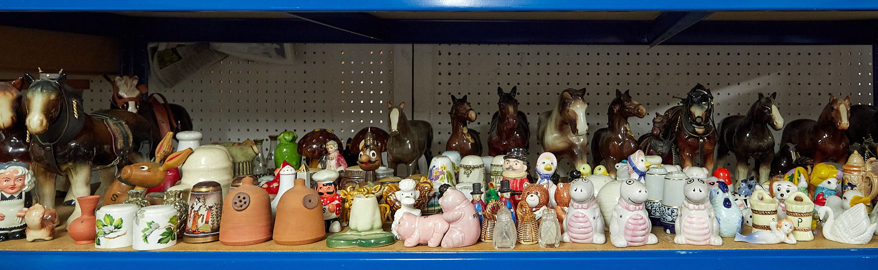 A huge collection of China wares mainly novelty salt and pepper pots.