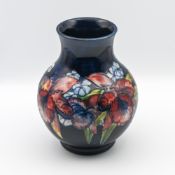 William Moorcroft, blue ground baluster vase, impressed mark WM signature. height 25cm