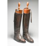 Pair of Antique leather riding boot on shoe trees, height 64cm