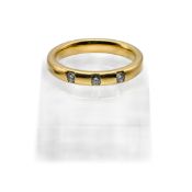 18ct gold wedding band with three diamonds, size O, 6.4g