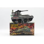 Japanese tinplate and battery operated action toy, firing cannons anti aircraft tank, boxed.