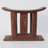 A carved wood African stool, height 43cm.