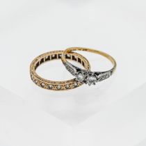 Two rings, 9ct gold, one with a full eternity of stones with diamond effect and one with two large