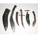 A Kukri knife, length 41cm including handle, possibly Indian knife and another (3).
