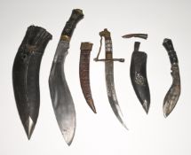 A Kukri knife, length 41cm including handle, possibly Indian knife and another (3).