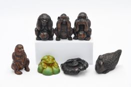 A small collection of seven wooden netsukes mainly Monkeys, with markings to base (7).