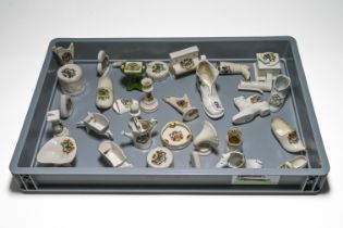 Collection of Plymouth Crested Ware, 31 pieces including Boots and shoes, Playing Cards and