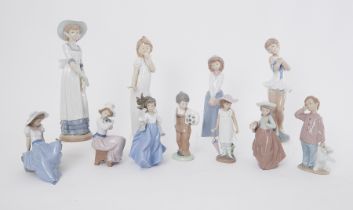 A collection of eleven Nao figures including 'Boy with Football' and 'Girl with Puppy' etc (11).