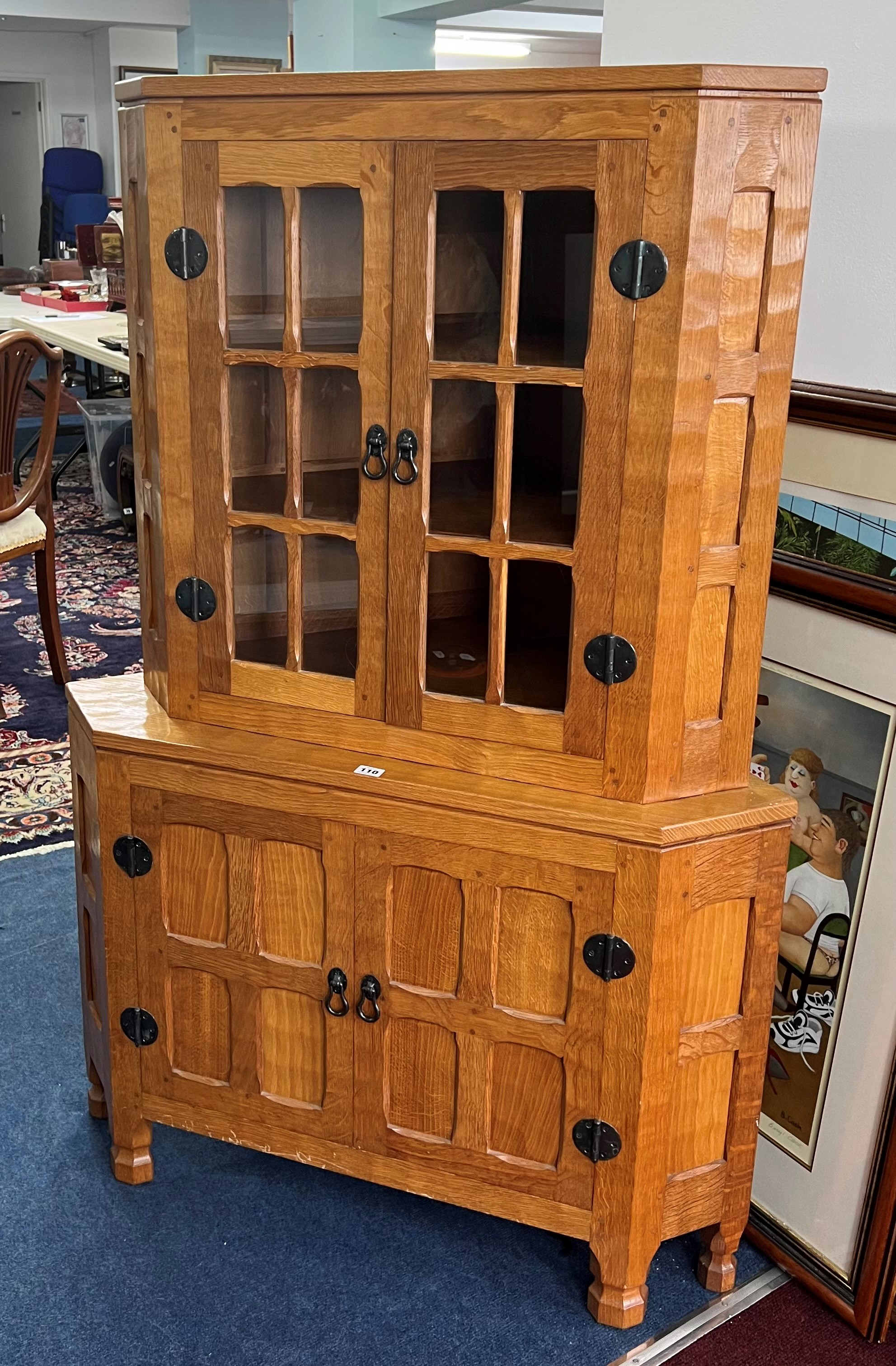 Sid Pollard of Thirsk (1914-1994) Ex Mouseman - corner cabinet fitted with two cupboards below, (two