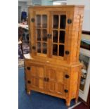 Sid Pollard of Thirsk (1914-1994) Ex Mouseman - corner cabinet fitted with two cupboards below, (two