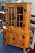 Sid Pollard of Thirsk (1914-1994) Ex Mouseman - corner cabinet fitted with two cupboards below, (two