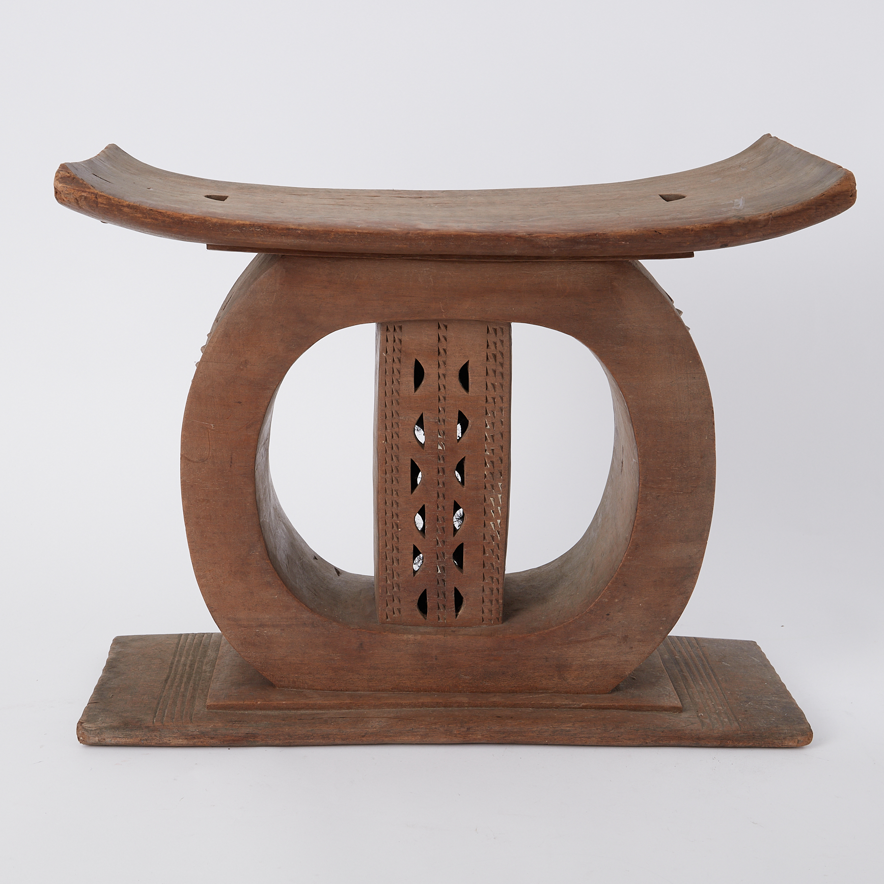 A carved wood African stool, height 45cm.