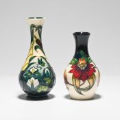 Two Moorcroft bottle vases, circa 1995, 1998, tallest 17cm.