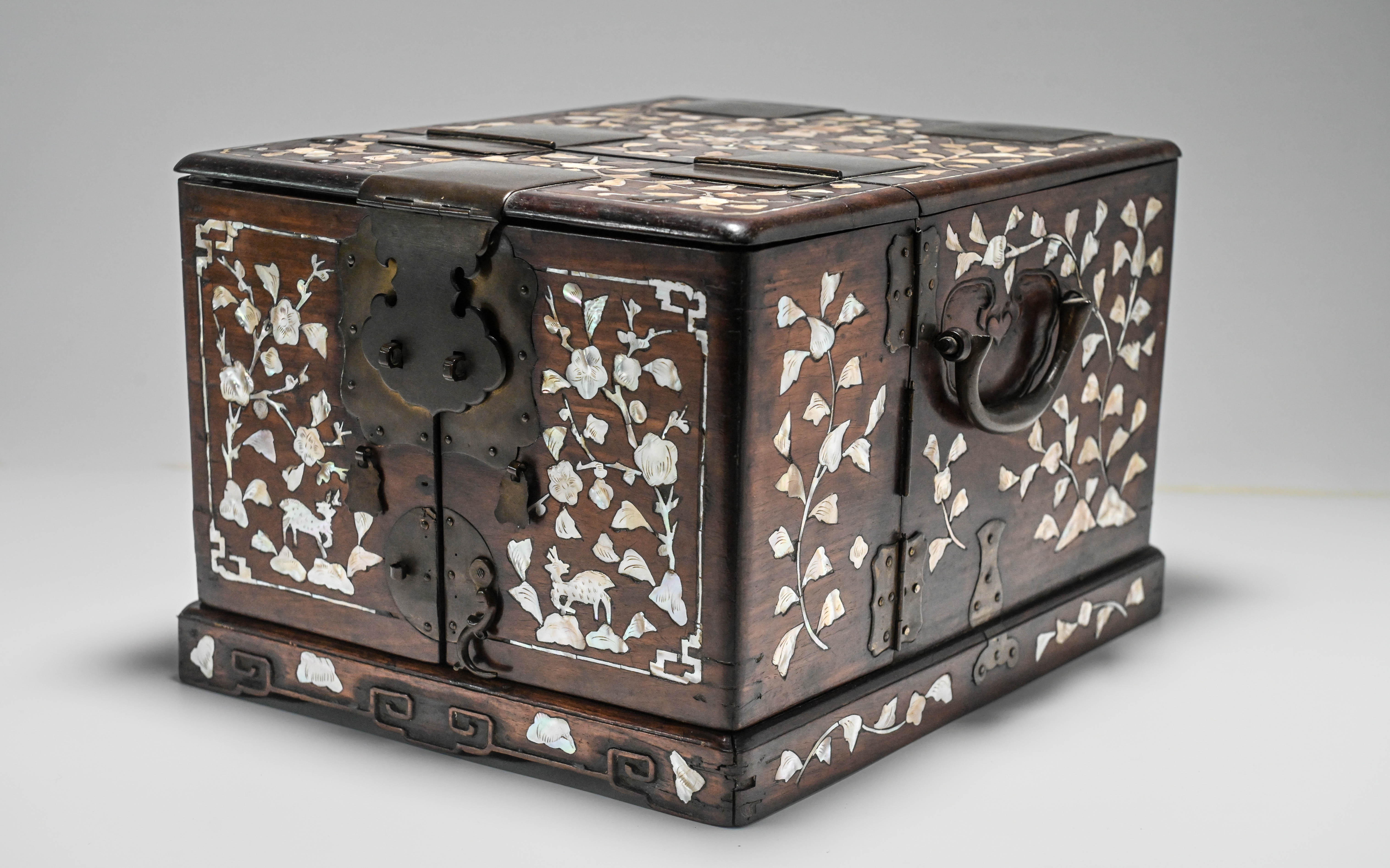 A mother-of-pearl inlaid hardwood Travelling Costmetics Box, early 20th century, of rectangular