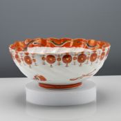 A lobed Kutani ware bowl. Finely painted in the centre with seventeen Lohan, the scalloped rim