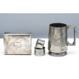 A Kut Hing Swatow Pewter Tankard Engraved with a dragon and set with a rectangular handle, 12.