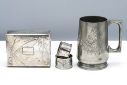 A Kut Hing Swatow Pewter Tankard Engraved with a dragon and set with a rectangular handle, 12.