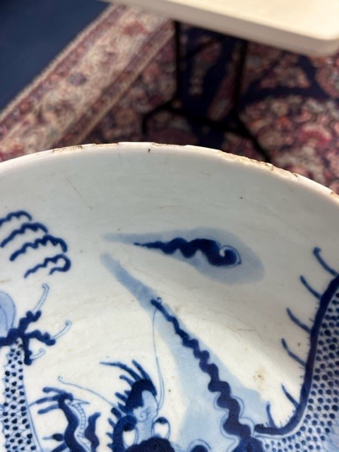 A Japanese blue and white bowl, freely painted with a dragon amongst flames and clouds, together - Image 22 of 30