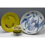 A Japanese blue and white bowl, freely painted with a dragon amongst flames and clouds, together