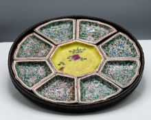 A nine piece "famille-verte" sweetmeat set, Qing dynasty, comprising a central octagonal saucer