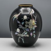 A Korean black enamel on brass mother-of-pearl inlaid jar, of ovoid form, inlaid on one side with
