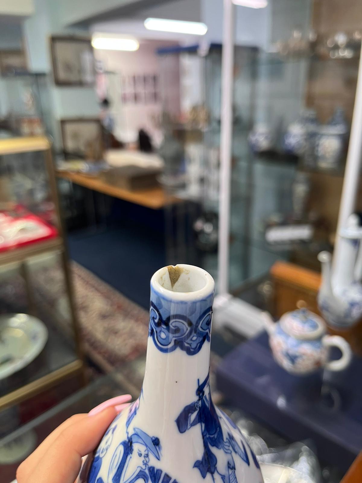 A collection consisting of a pair of blue and white bottle vases, 19th century, the globular body - Image 26 of 36