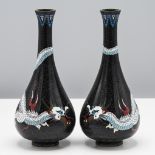 A pair of Chinese cloisonné enamel vases, c.1900. Each of pear shape and decorated with a