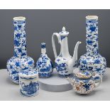 A collection consisting of a pair of blue and white bottle vases, 19th century, the globular body