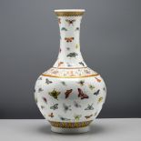 A ‘famille-rose’ butterfly vase, six character mark and period of Guangxu (1875-1908) Enamelled
