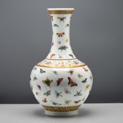 A ‘famille-rose’ butterfly vase, six character mark and period of Guangxu (1875-1908) Enamelled