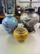 A yellow glazed Japanese Jar, finely decorated on the bright yellow ground in gilding with birds and