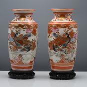 A pair of Japanese Kutani vases, Meiji period (1868-1912) Each of baluster form with a short waisted