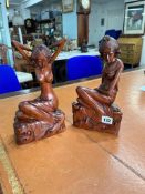 Two carved wood modern Balinese figures.