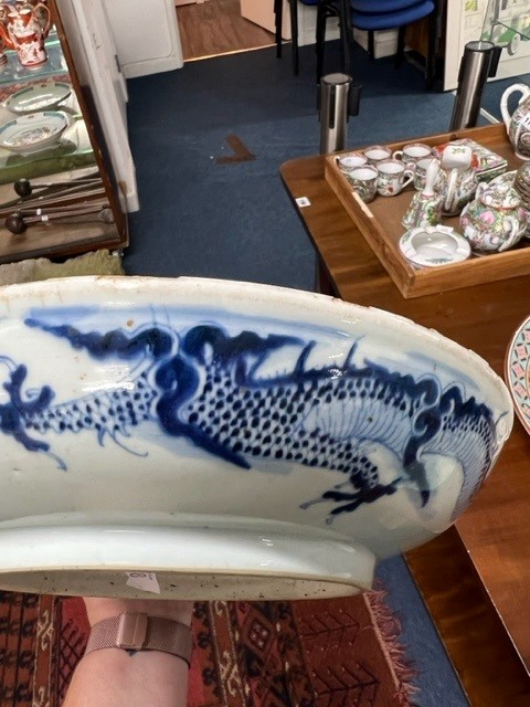 A Japanese blue and white bowl, freely painted with a dragon amongst flames and clouds, together - Image 28 of 30