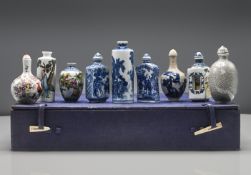 A group of 9 porcelain snuff bottles, 19th/20th century, comprising; of differing shapes and