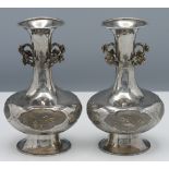 A pair of Chinese export silver Kangxi style vases, 19th century, each with the compressed ovoid