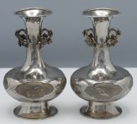 A pair of Chinese export silver Kangxi style vases, 19th century, each with the compressed ovoid